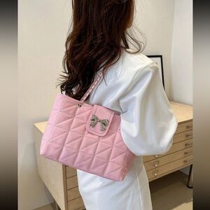 Chic Pink Quilted Shoulder Bag with Silver Bow